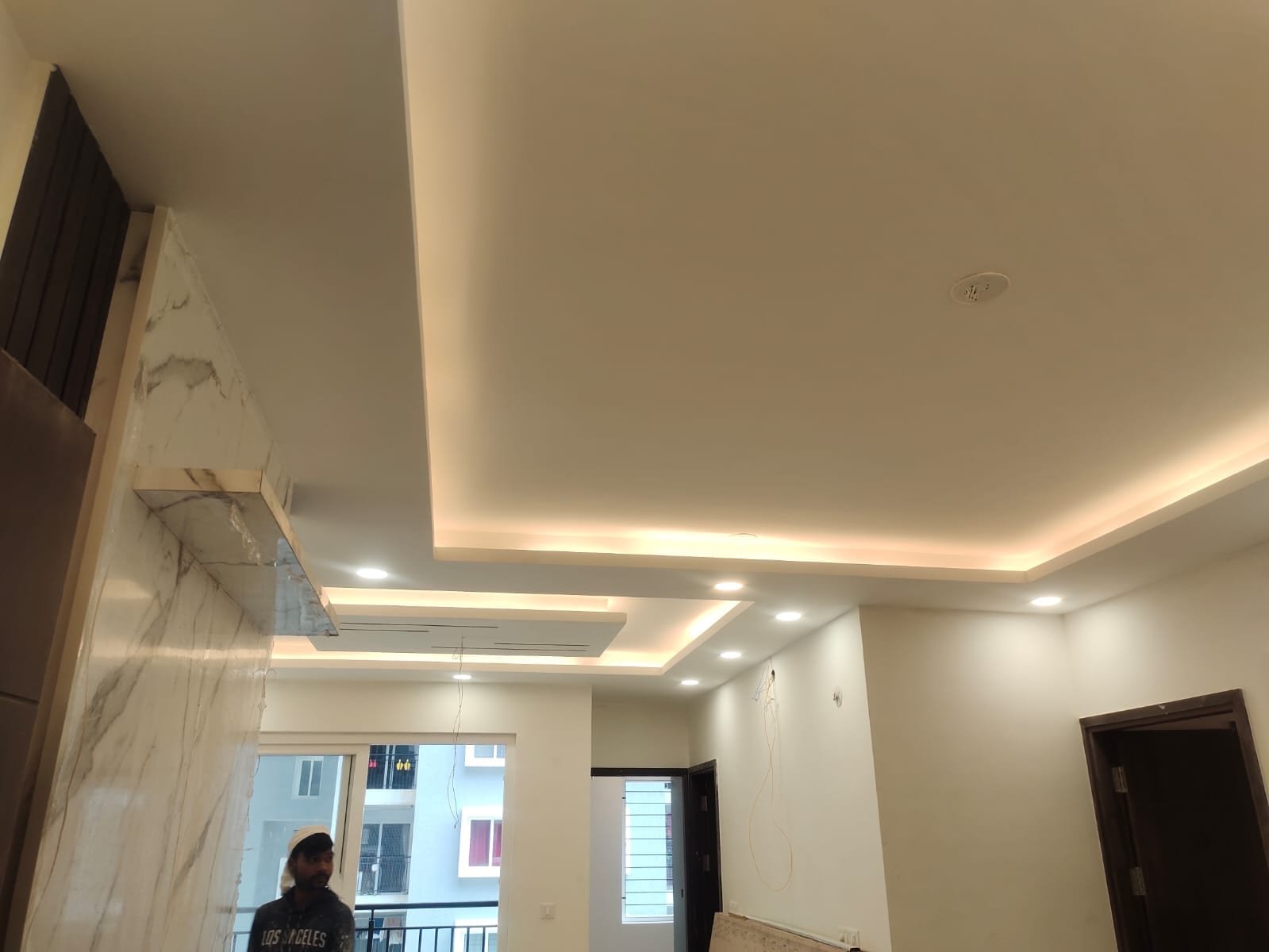 JP Nagar renovation POP ceiling — clean modern multi-level tray