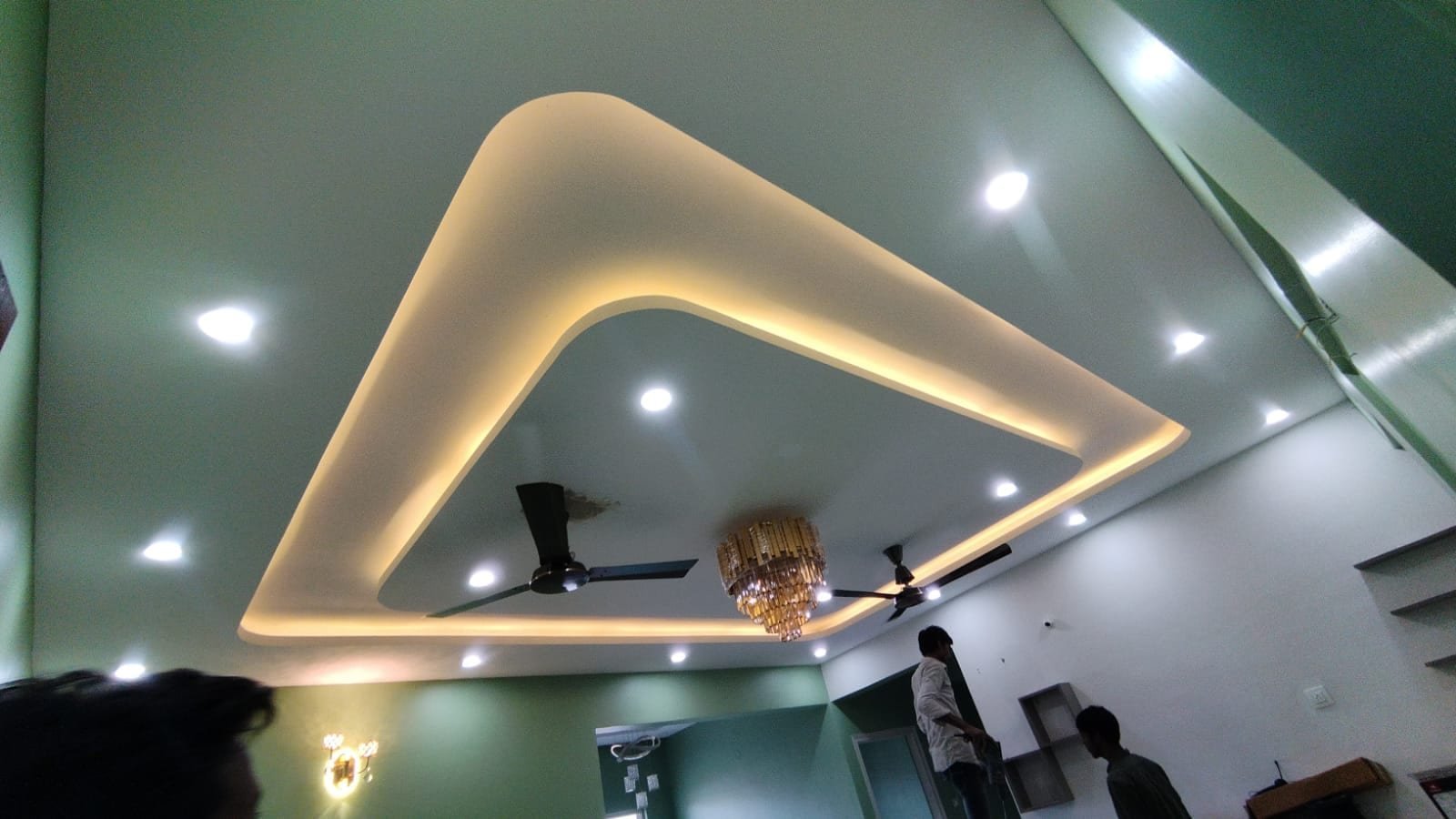 Yelahanka villa POP ceiling with chandelier housing in double-height foyer